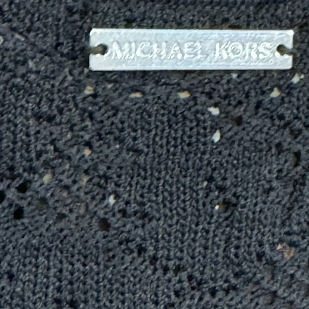 MICHAEL Michael Kors description discover